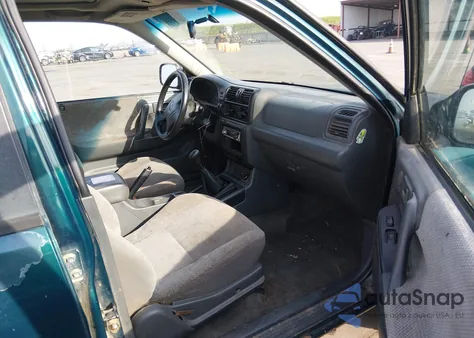 1999 Isuzu Rodeo Ls/Lse/S 3.2L z USA, uszkodzony, nr VIN 4S2CK58W7X4381253